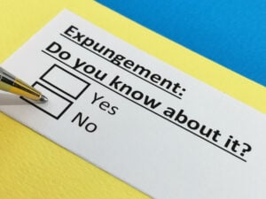 One person is answering question about expungement on a questionnaire 